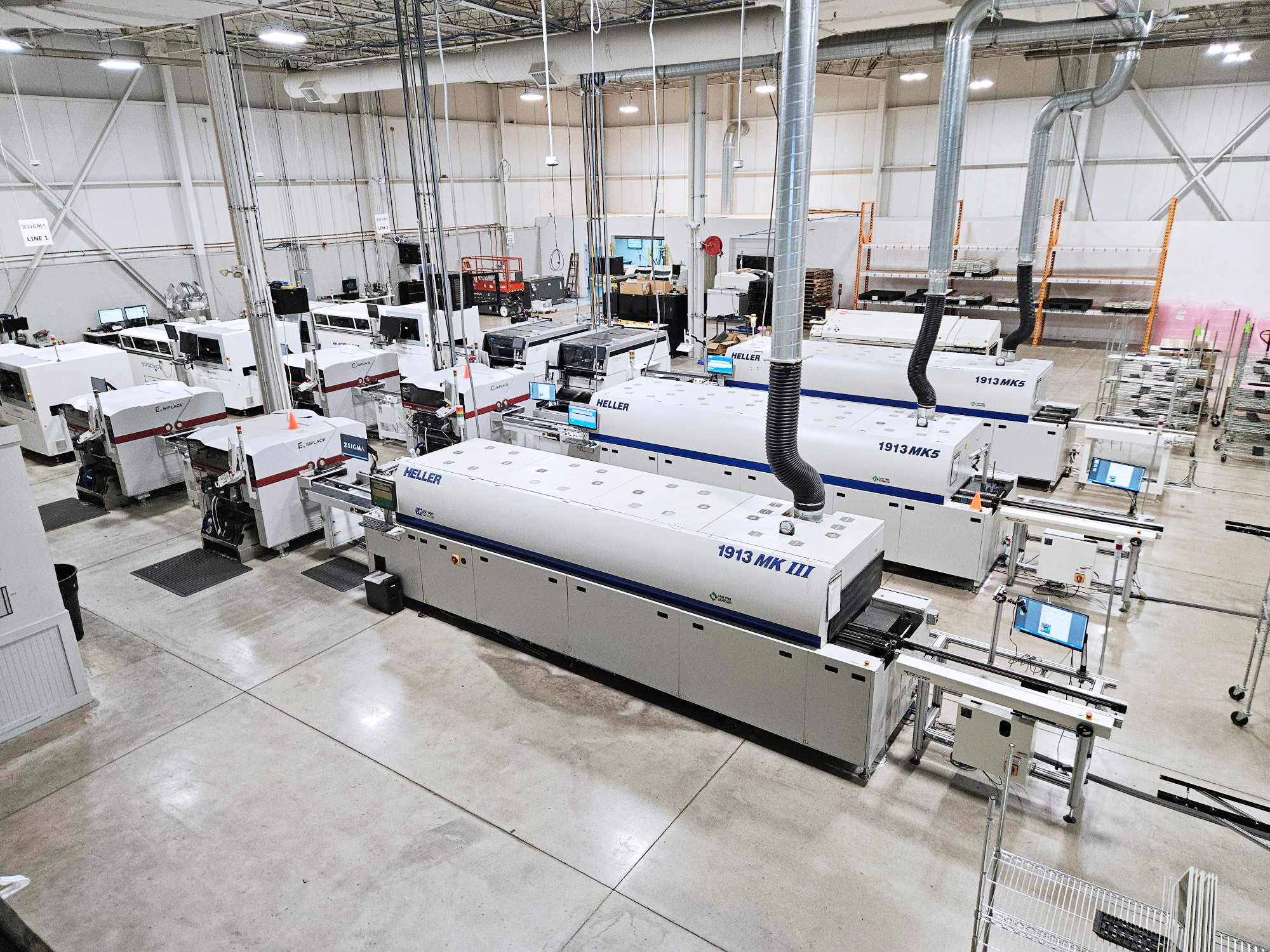 Electronics manufacturing service production floor with automated assembly